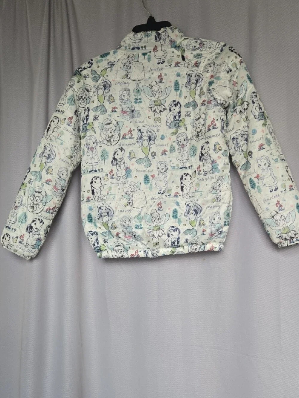 Disney Quilted Puffer Jacket with Cream Background and Pastel Accents